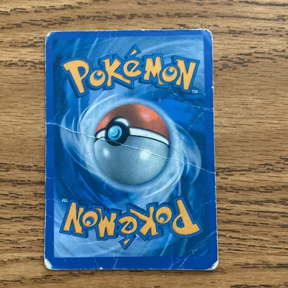 Pikachu Holo card very well played and loved. Has many crinkles and lines in it. - Picture 5 of 5